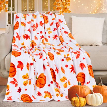 fall blanket with pumpkin and maple designs